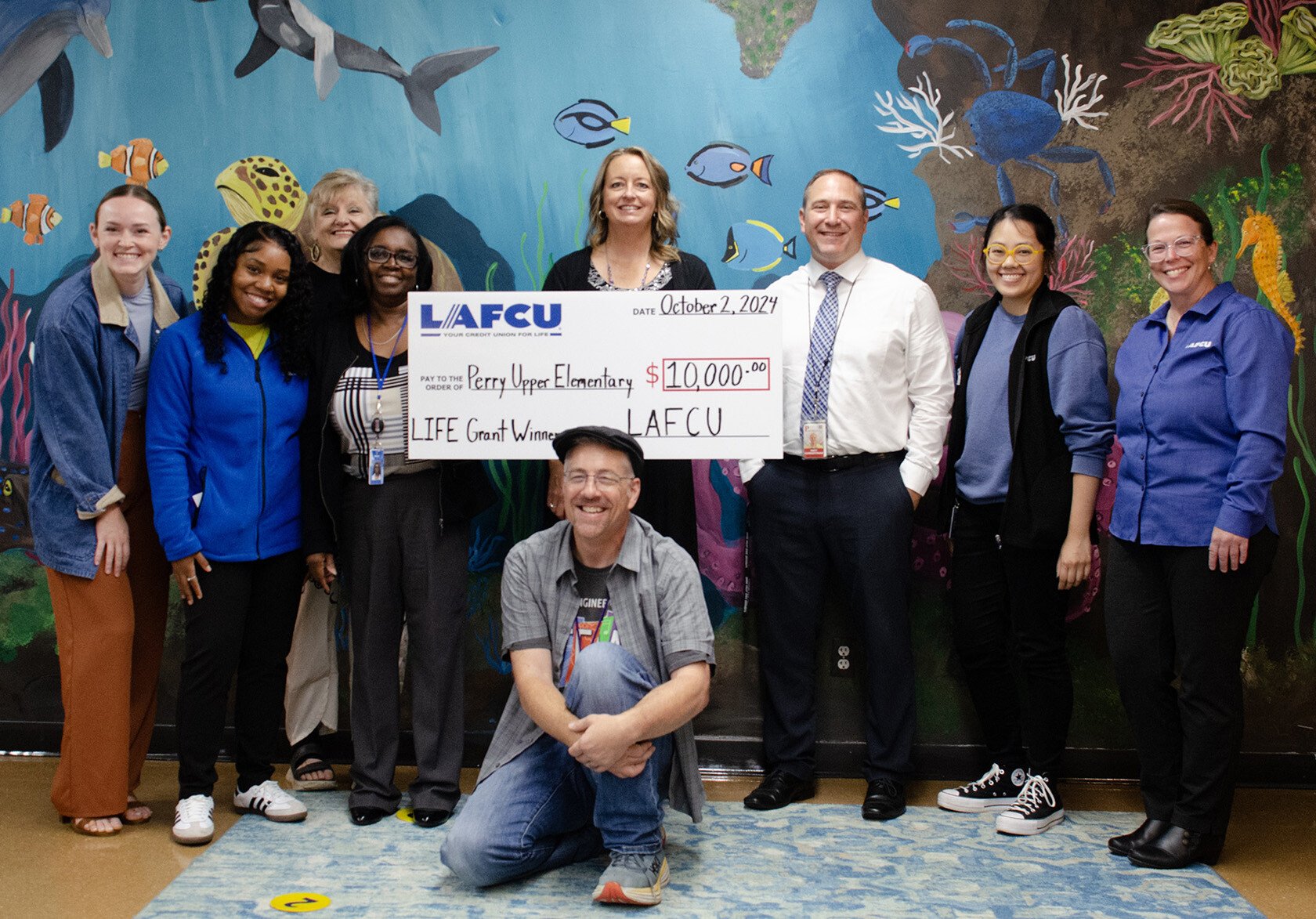 1-LAFCU Group with check