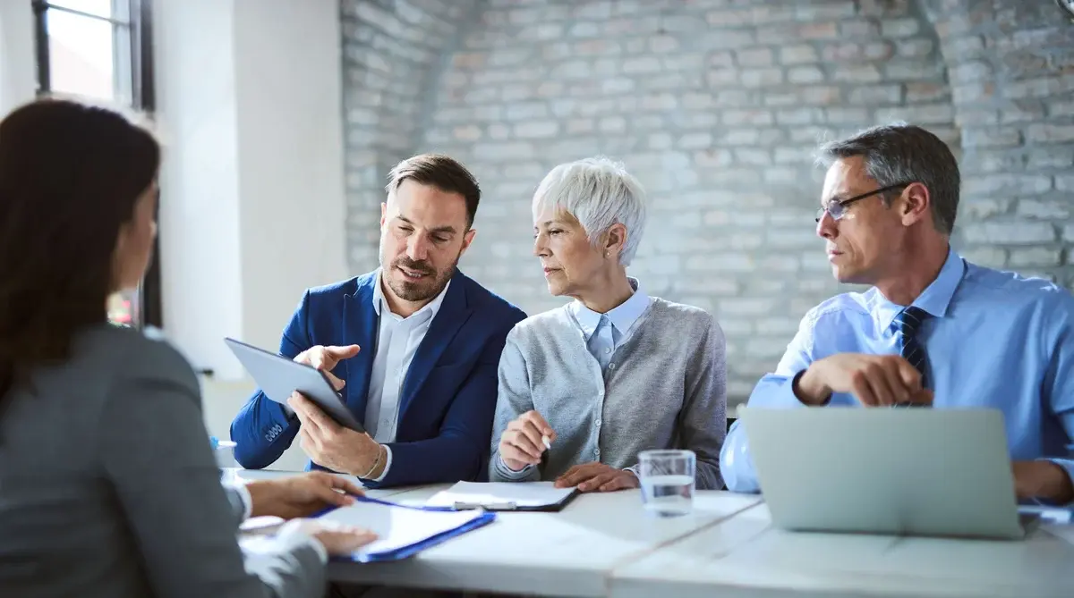 Business People Reviewing Screen Email Header Image