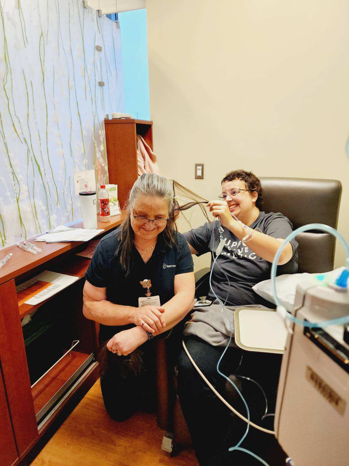 Patient cuts caregivers hair