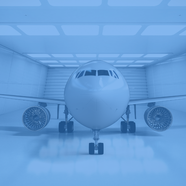 An airplane in a hangar