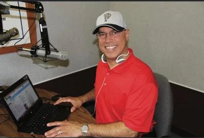 Tony Conley posing for a professional headshot.