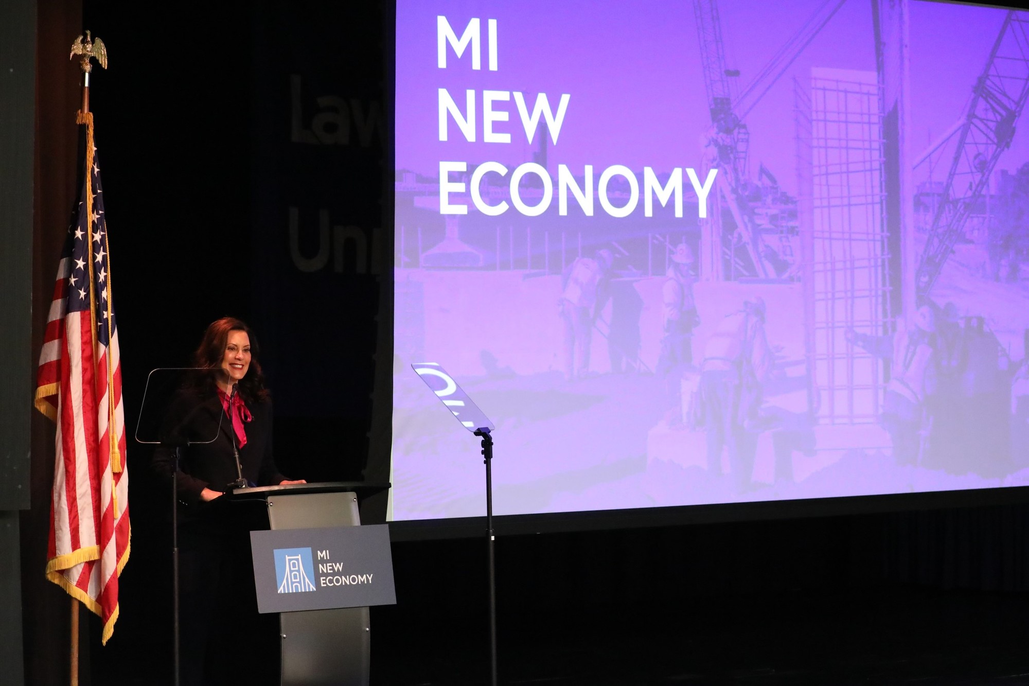 Gov. Whitmer speaks at podium during event