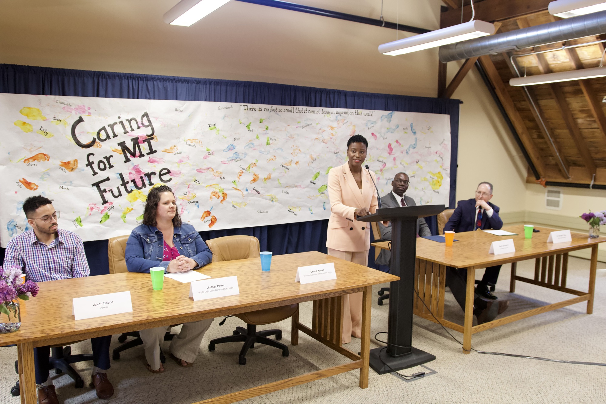 LARA Director Orlene Hawks speaks at podium during the event. 