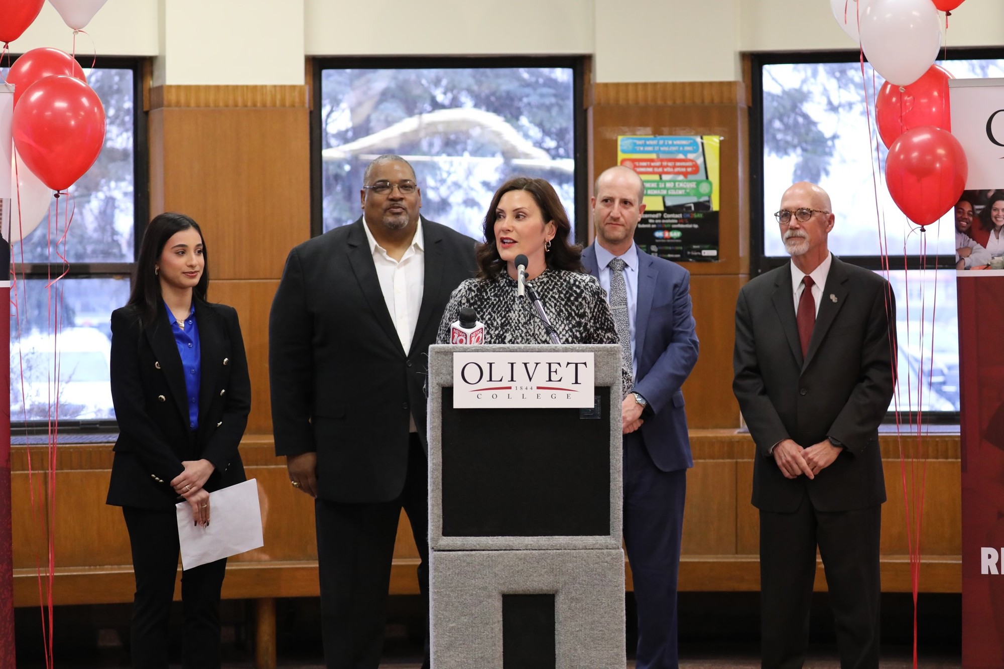 Gov. Whitmer speaks at podium during event.