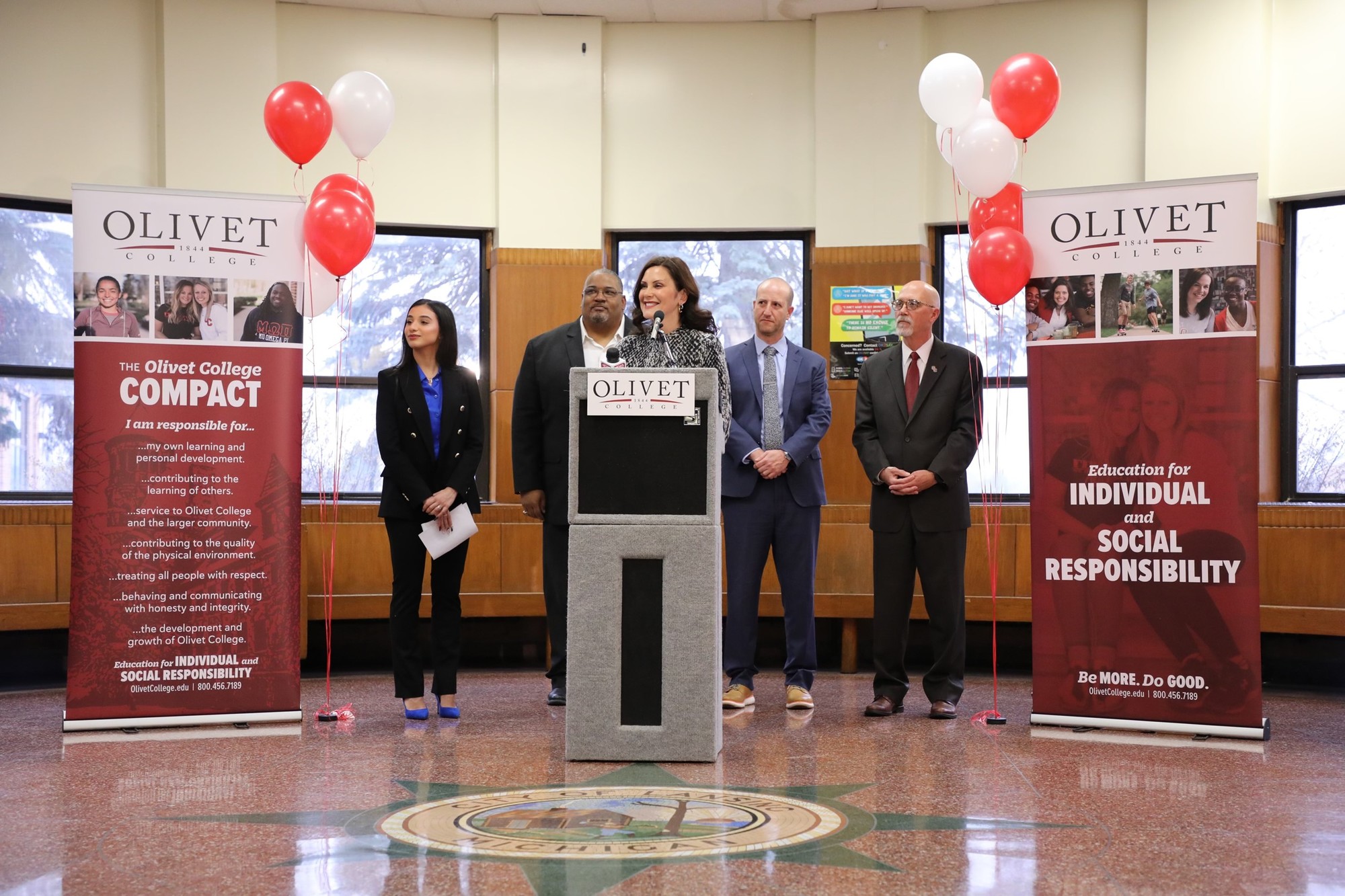 Gov. Whitmer speaks at podium during event.