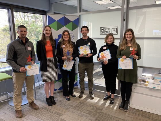 STEM Stars pose with their awards on April 25.